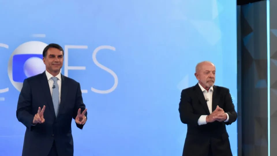Lula e Flávio Bolsonaro chegam ao segundo turno em disputa acirrada