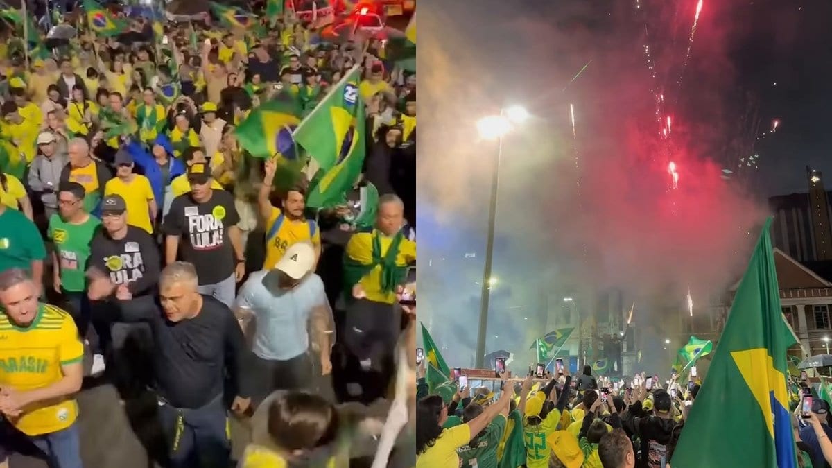 Debaixo de chuva, apoiadores de Flávio Bolsonaro fazem ato com fogos e bandeiras pelas ruas de Joinville